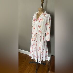 Floral true vintage secretary dress. Breezy and swingy. Fits like Women’s M.